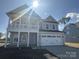 Beautiful two-story home with a lovely front porch and a convenient two-car garage in a peaceful neighborhood at 3213 Mcharney Dr # 32, Harrisburg, NC 28075