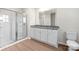 Bathroom features a large glass shower, granite countertops, and white cabinets at 3263 Maple Ridge Dr, Gastonia, NC 28052