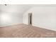 Spacious bedroom features a large closet and neutral carpeting at 3263 Maple Ridge Dr, Gastonia, NC 28052