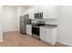 Kitchen with stainless steel appliances, granite countertops, and white cabinets at 3263 Maple Ridge Dr, Gastonia, NC 28052