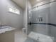 Modern bathroom features a stylish glass shower, granite vanity, and contemporary fixtures, creating a spa-like atmosphere at 3528 Thunder Rd, Maiden, NC 28650