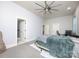 Bright bedroom featuring a large window, comfortable bed, and an en-suite bathroom for added privacy and convenience at 3528 Thunder Rd, Maiden, NC 28650