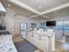 Bright kitchen and living room features granite countertops and modern furniture at 3528 Thunder Rd, Maiden, NC 28650