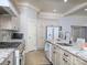 Bright kitchen features granite countertops, stainless steel appliances, and ample cabinet space at 3528 Thunder Rd, Maiden, NC 28650