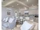 Open concept kitchen with an island, bar stool seating, and views to living space at 3528 Thunder Rd, Maiden, NC 28650