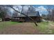 Exterior view of a house with a large wooden deck and spacious yard, perfect for outdoor living and entertaining at 406 Third Ne Ave, Conover, NC 28613