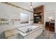 Modern bathroom with soaking tub, tiled walls, granite countertop, and wooden shelves at 406 Third Ne Ave, Conover, NC 28613