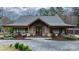 Beautiful home with stone accents, covered porch, double door entry, and meticulous landscaping at 406 Third Ne Ave, Conover, NC 28613