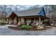 Charming single story home with covered porch, stone accents, and landscaped front yard at 406 Third Ne Ave, Conover, NC 28613