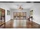 Bright living room with hardwood floors, large sliding glass doors leading to a wooden deck at 406 Third Ne Ave, Conover, NC 28613