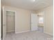 Bedroom features neutral carpet, a walk-in closet, and a door leading to another room at 417 Baker Street Ext, Rock Hill, SC 29730