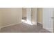 Bedroom features neutral carpet, a walk-in closet and a door leading to a bathroom at 417 Baker Street Ext, Rock Hill, SC 29730