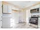 Well-lit kitchen featuring updated appliances and ample storage at 417 Baker Street Ext, Rock Hill, SC 29730