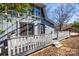 Stylish home featuring a gray exterior, complemented by a white railing and a welcoming front entrance at 5082 Mariana Ct, Tega Cay, SC 29708