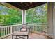 Relaxing balcony with wooded view, perfect for outdoor seating at 537 Southeast Dr # 537, Davidson, NC 28036