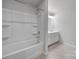 Clean bathroom showcasing tub, updated faucet, and modern vanity at 6814 Piper Thorn Way, Indian Land, SC 29707