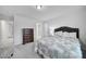 Bedroom featuring a chest of drawers, soft carpet, and a view to the bathroom at 6814 Piper Thorn Way, Indian Land, SC 29707