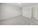 Spacious bedroom featuring carpeted floors and neutral paint at 6814 Piper Thorn Way, Indian Land, SC 29707