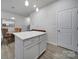 Stylish kitchen with ample counter space and access to the dining area at 6814 Piper Thorn Way, Indian Land, SC 29707