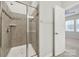 Glass-enclosed shower with tiled walls and a shower head at 6814 Piper Thorn Way, Indian Land, SC 29707