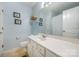 Well-lit bathroom featuring a vanity with a sink and framed artwork at 706 Cherryfield Pl, Rock Hill, SC 29732