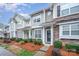 Beautiful townhome with well-kept front yard, inviting entrance, and stone veneer at 706 Cherryfield Pl, Rock Hill, SC 29732