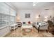 Bright living room with large windows, neutral decor, and stylish furnishings at 706 Cherryfield Pl, Rock Hill, SC 29732