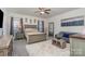 Primary bedroom with neutral tones, a king-sized bed, and stylish decor at 8651 Shadetree St, Huntersville, NC 28078