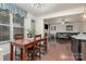 View of the dining and living rooms with an open floor plan at 8651 Shadetree St, Huntersville, NC 28078