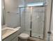 Modern bathroom with glass-enclosed shower featuring white subway tile and new fixtures at 8720 Acadia Pkwy # 597, Sherrills Ford, NC 28673