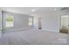 Bright bedroom featuring neutral walls and plush carpet, perfect for relaxation and comfort at 8720 Acadia Pkwy # 597, Sherrills Ford, NC 28673