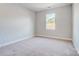 Bedroom with neutral carpet and paint and natural light at 8720 Acadia Pkwy # 597, Sherrills Ford, NC 28673