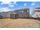 The exterior of the home with a large backyard and a covered patio at 8720 Acadia Pkwy # 597, Sherrills Ford, NC 28673