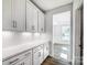 Bright pantry with white shelving providing ample storage space at 8720 Acadia Pkwy # 597, Sherrills Ford, NC 28673