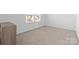 Cozy bedroom featuring neutral paint and plush carpeting at 9022 Colwick Hill Ln, Charlotte, NC 28215