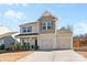 Beautiful two-story home with a two-car garage and inviting curb appeal at 9022 Colwick Hill Ln, Charlotte, NC 28215