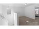 Upstairs hallway featuring natural light, carpeting, and neutral paint at 9022 Colwick Hill Ln, Charlotte, NC 28215