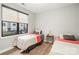 Comfortable bedroom with natural light and two twin beds at 946 E 8Th St, Charlotte, NC 28204