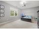 Bedroom with blue accents, a black bed frame, one window and a ceiling fan at 9743 Aegean Ct, Huntersville, NC 28078