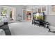 Bonus room featuring a TV and a view into the kitchen at 9743 Aegean Ct, Huntersville, NC 28078