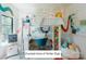 Unique bedroom with lofted bed, built-in desk, and colorful decor at Lot 4 Holbrook Rd, Fort Mill, SC 29715