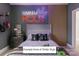 Fun bedroom featuring a neon sign, guitar wall mounts, and unique decor at Lot 4 Holbrook Rd, Fort Mill, SC 29715