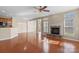 Spacious living room with fireplace, hardwood floors, and ceiling fan at 119 Snead Rd, Fort Mill, SC 29715