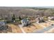 Aerial view of the houses and neighborhoods showcasing spacious lots and landscaping at 12515 Hashanli Pl, Matthews, NC 28105