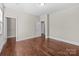 Neutral bedroom with hardwood floors and ample space at 12515 Hashanli Pl, Matthews, NC 28105