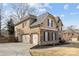 A beautiful two-story home featuring a spacious three-car garage and well-maintained landscaping at 12515 Hashanli Pl, Matthews, NC 28105