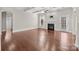 Comfortable living room with fireplace, hardwood floors, and an open feel at 12515 Hashanli Pl, Matthews, NC 28105