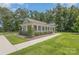 Well-maintained community building with a covered porch and attractive landscaping at 1308 Stone Marker Dr, Monroe, NC 28112