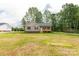Inviting single-story home with a well-maintained lawn and mature trees at 1323 Mack Dr, McConnells, SC 29726