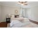 Serene main bedroom features a plush bed, soft lighting, and a decorative mirror, creating a relaxing retreat at 138 Lansdowne Rd, Charlotte, NC 28270